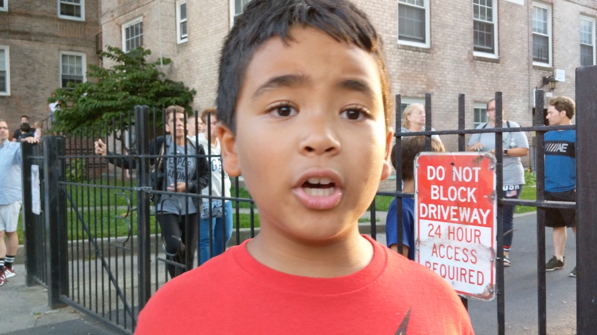 Young Konnor on a street corner